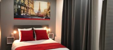 chambre deluxe - grand lit double © Hôtel Paris Clichy